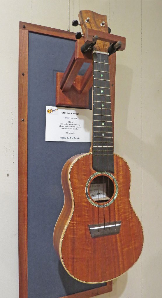 16 - Sam Rosen's all koa concert ukulele with curly mango binding, rosewood fretboard and bridge. Paua abalone rosette