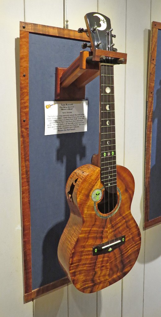 26 - Tom Russell's outer space themed all koa tenor ukulele, ebony fretboard and headstock. Black, white and gold mother of pearl, sea snail shell and recon stone inlay