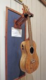 12 - Barbara Bach's all mango tenor ukulele with walnut binding, bridge and fretboard. Butterfly headstock is koa, mango, maple and walnut.jpg