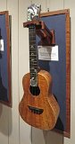 23 - Jane Klassen's curly koa tenor ukulele with ebony bridge, fretboard and headstock. Hand-cut fretboard and headstock inlay of paua abalone, black and white mother of pearl.jpg