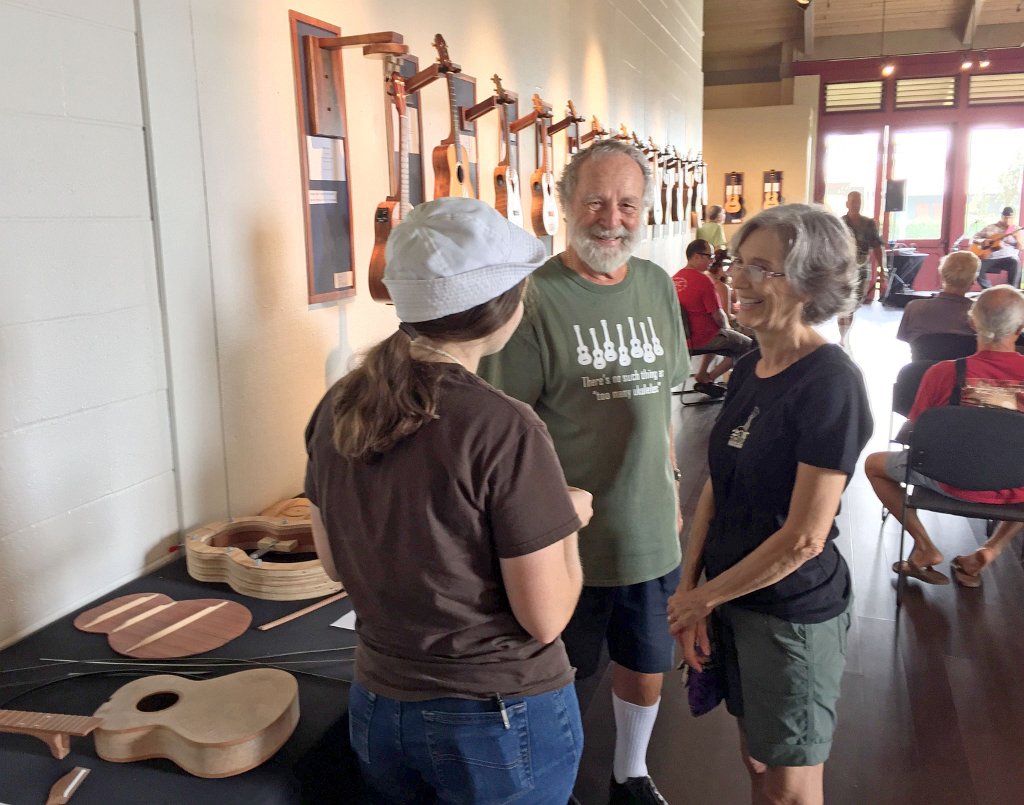 Gary and Pat Cassel greet a guest to the exhibit