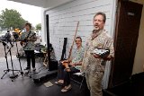 BIUG President Woodley White (right) announces the ukulele give-away during the opening night as Alan Hale (left) and Konabob Stoffer entertain