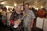 BIUG President Woodley White poses with ukulele give-away winner Donna Keefer of Pahoa.jpg