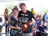 Ukulele winner Sharon Bowling with Alan Hale. The Makala uke was donated by Hilo Guitars and Ukuleles.jpg