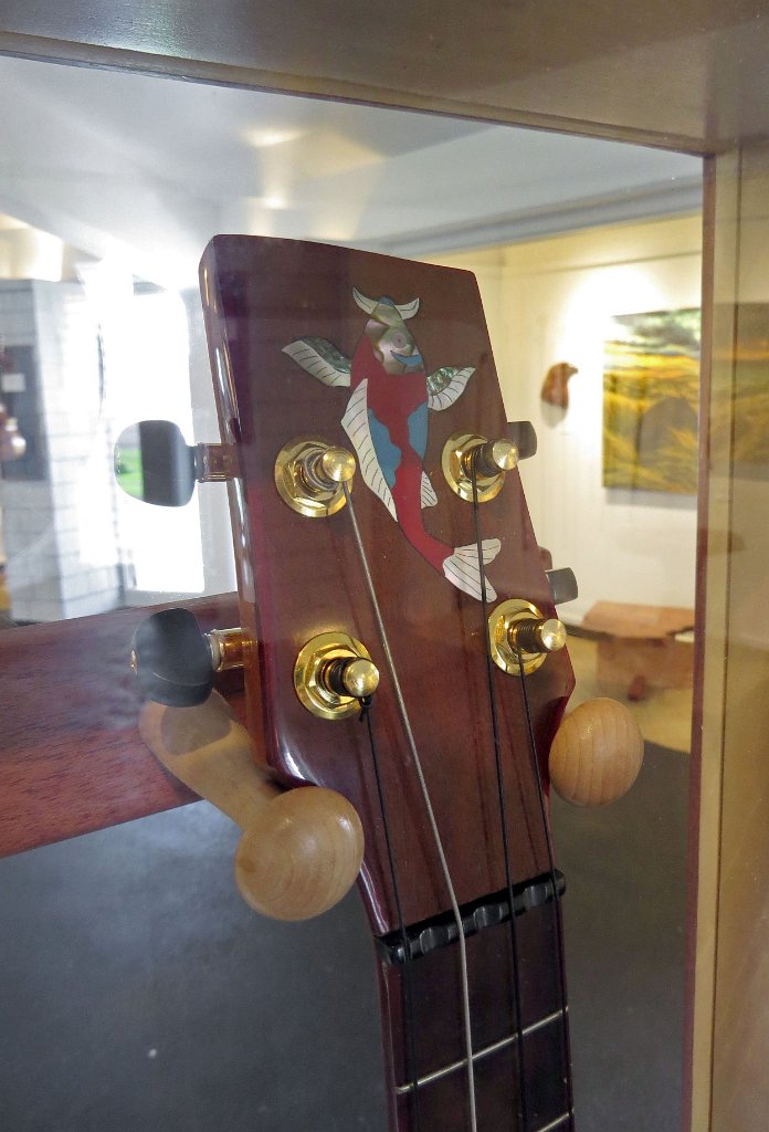 12 - Detail of headstock inlay on Bob Gleason's mango and curly redwood tenor ukulele