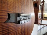 29 - Close up of bridge on Woodley White's koa tenor ukulele