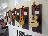 42 - A group of ukuleles on display