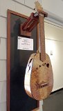17 - Rodney Crusat's birdseye koa pineapple tenor ukulele with dolphin and Hawaiian island design