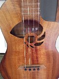 18 - Closeup of Rodney Crusat's curly koa baritone ukulele