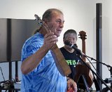 07 Bob Gleason and one of the give-away ukulele donated by Roy Cone of Ukulele World.jpg
