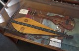26 Carlos Newcomb's East Indian rosewood and Sitka spruce dulcimer and Bob Gleason's curly koa lap steel guitar