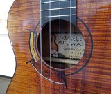 41 Closeup of the intarsia style rosette of mixed woods on Woodley White's curly koa tenor ukulele.jpg