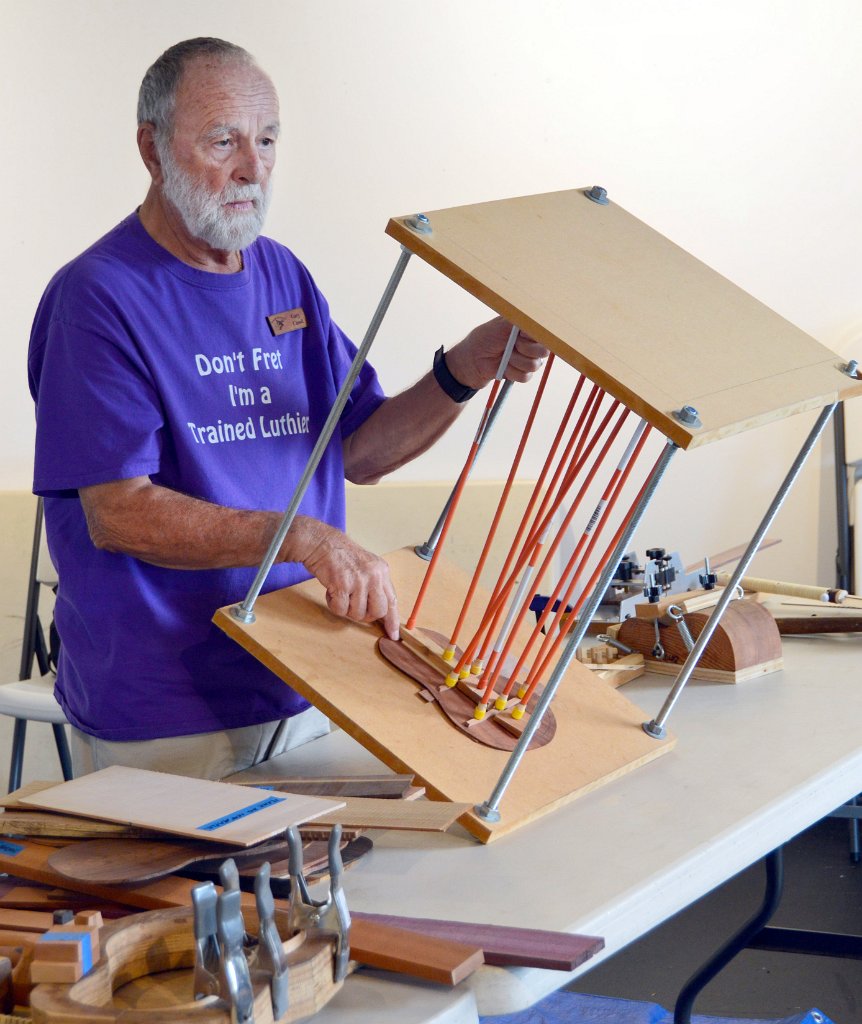 06 Gary Cassel tips a go-bar clamping deck to display freshly glued braces