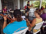 2014 Big Island Ukulele Guild exhibit 17  Alan Hale leads a kanikapila as Lee Maniscalco backs him up with her bass ukulele during the 2014 BIUG exhibit at Wailoa Center in Hilo.
