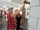 2014 Big Island Ukulele Guild exhibit 24  BIUG member Tom Parse shows off his ukulele on display at the 2014 BIUG exhibit at Wailoa Center in Hilo