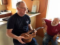 08 - BIUG President Tom Russell shows off an uke