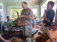 4 - Tom Russell points out details on his uke, including a segmented rosette