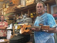 06 - Bob Gleason holds one of Bryan Luker's ukulele